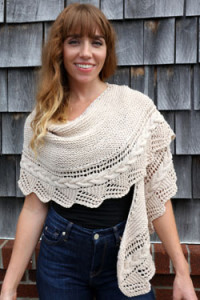 Free Pattern F767 Worsted Merino Superwash Cabled Edge Shawl. This one is perfect for the girl who has everything. Whether it's a night out on the town or a trip to the mall, this versatile and beautifully detailed shawl is a must for any wardrobe.